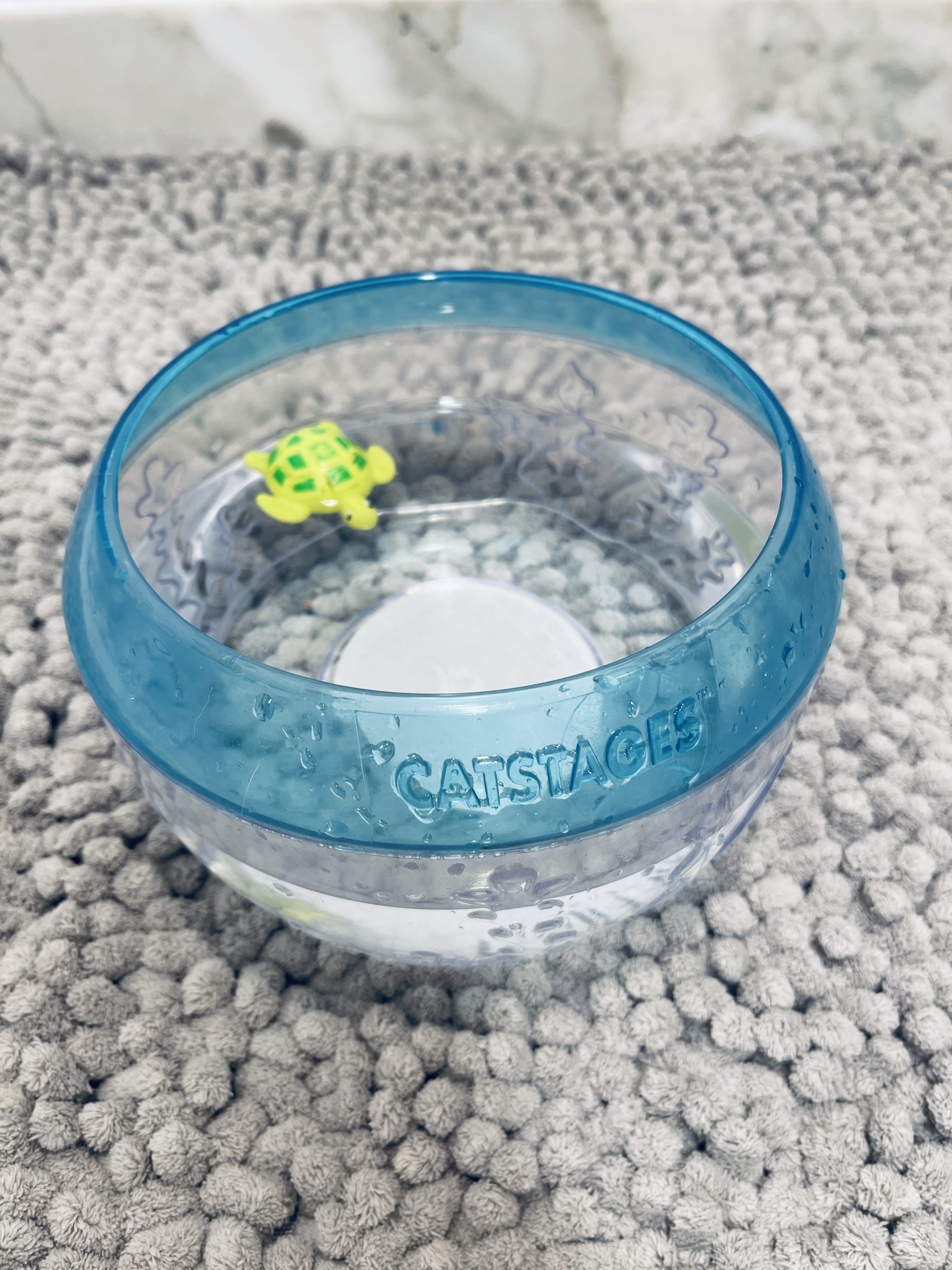 Thelma's Catstages water bowl with a little floating turtle toy