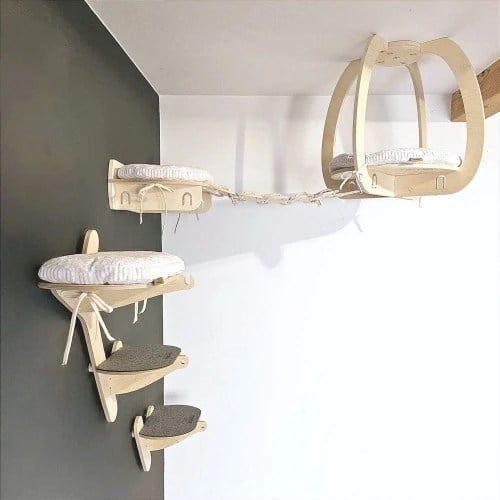 An alternate installed view of the PRASKA Sky Park 2 showing its wall steps, branch, bridge and ceiling bed